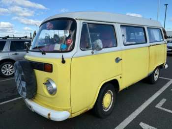 2006 - T2 Camper Van Bay Window Rock & Roll Bed. Red leather seats.